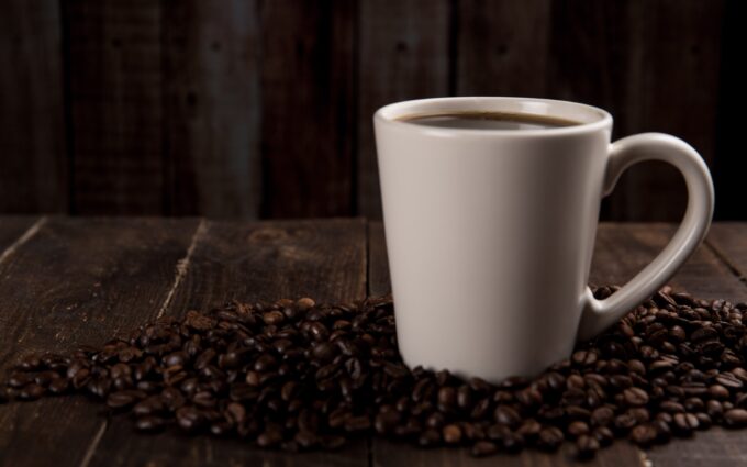 Coffee Mug Surrounded With Coffee Beans Desktop Wallpapers