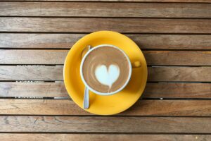 Cup of Decorated Cappuccino on Wooden Surface Desktop Wallpapers